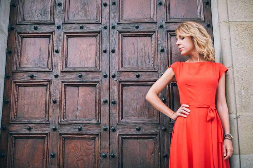 Yuliya Savostina in a red dress